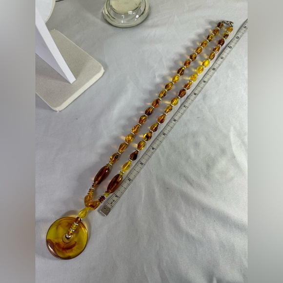Unusual unique swirled amber colored statement necklace - Picture 3 of 7
